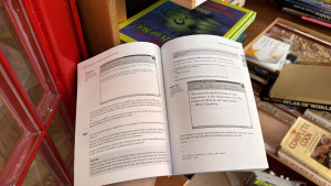 programming-books-in-village-phone-room-2026-04-18-18.45.19-300x169 村里电话亭里的书籍，翻开一本计算机书。 